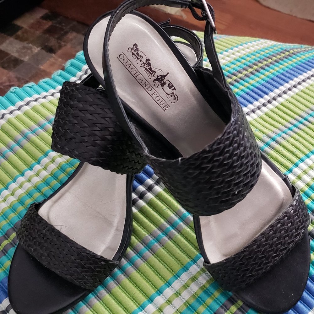 Coach and four black sandals.